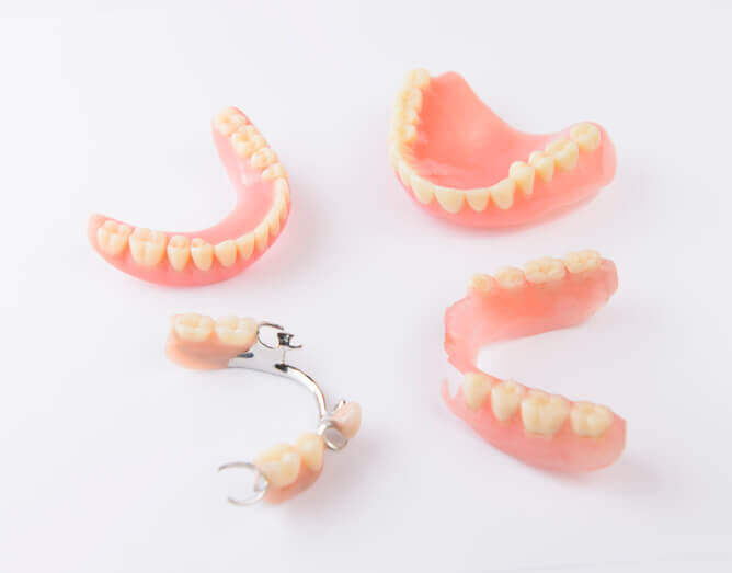 Complete and partial dentures